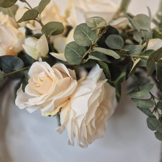 Cream rose and eucalyptus wreath on natural wicker base – exclusive to Lily Bloom. Buy online at www.lilybloom.ie or visit our Gorey store.