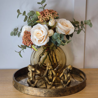 Amber Moments styling bundle featuring fern tray, amberlight vase, gold “See No Evil” monkeys, and faux floral bouquet – Available at Lily Bloom, Gorey, Ireland.