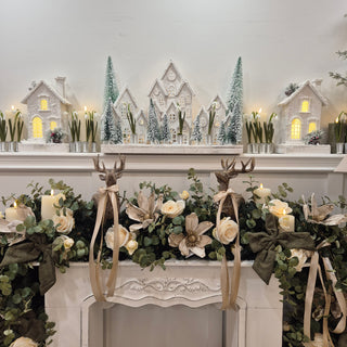 2.7m luxury eucalyptus garland with cream roses, gold poinsettias, satin bows, and optional resin stag figures – handcrafted décor by Lily Bloom, Gorey, Ireland.