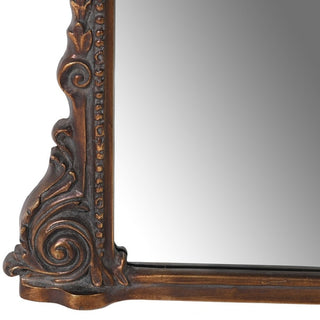 Antique brass overmantle mirror with ornate curved frame. Carved-effect resin design. Available online or in-store at Lily Bloom, Gorey, Ireland.