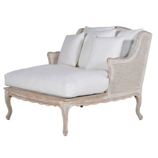 Ambrose Club Chair with oak frame, cotton upholstery, and rattan panel detailing—exclusive to Lily Bloom, available online at www.lilybloom.ie or in-store in Gorey, Ireland.