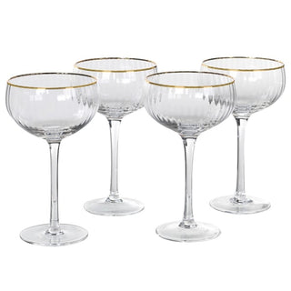Set of 4 fluted ribbed champagne coupes with rounded bowl and gold rim – The Astoria Glass, available at Lily Bloom, Gorey, Ireland.
