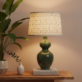 Justine Green Ceramic Table Lamp by Lily Bloom glazed green base with pleated floral fabric shade, elegant Irish home lighting.