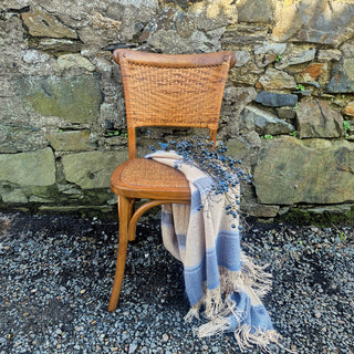 The William Chair – Elmwood dining chair with cream and blue wolly throw. Available at Lily Bloom, Gorey. Delivery included across Ireland.