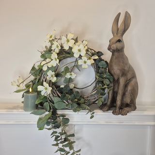 The Easter Styling Trio – Cimi floral wreath, sage green ribbed candle, and Hugo the Hare. Spring home décor exclusive to Lily Bloom. Buy online or in-store.