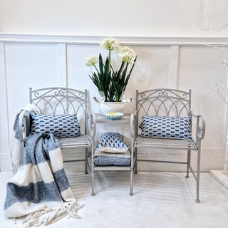 Love Seat with grey washed finish, vintage iron companion seat for gardens – buy online at www.lilybloom.ie or visit Lily Bloom, Gorey, Ireland