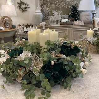 Close-up of Bowbrook Halo featuring velvet green florals, poinsettia accents and Lily Bloom bow. Available at Lily Bloom, Gorey, Ireland.