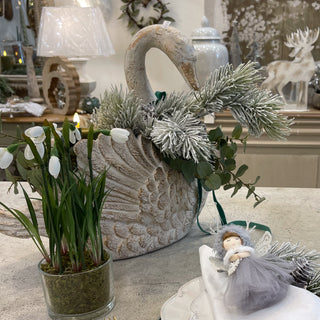 Singleton Park Arrangement featuring distressed swan vase, snowy greenery, faux eucalyptus and snowdrop plant. Buy online at www.lilybloom.ie.