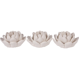 Laura Ashley off-white lotus tealight holders, set of three – available at Lily Bloom, Gorey, Ireland.