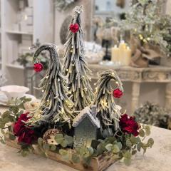 Exclusive Lily Bloom Christmas tray arrangement with light-up bending trees, rustic house, hedgehog, eucalyptus and red hydrangea – available at Lily Bloom, Gorey, Ireland.