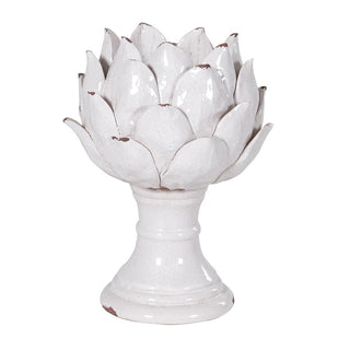 Stoneware candleholder with sculpted petal-style base and cream distressed finish – available at Lily Bloom, Gorey, Ireland