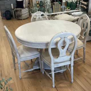 Toni Round Dining Set with Chantilly round pedestal dining table and four Marcel upholstered dining chairs in soft cream and neutral tones. Available at Lily Bloom Gorey and online at www.lilybloom.ie
