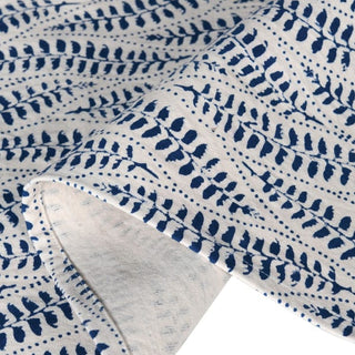 Set of four white cotton placemats with navy fern block print – Indigo Leaf Placemats, available at Lily Bloom, Gorey, Ireland.