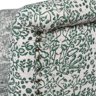 Close-up of brass studs and deep buttoned detailing on the Laurence Green Paisley Sofa — rich green cotton fabric with refined handcrafted finish.