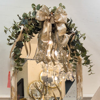 Annagh Swag – handcrafted eucalyptus and gold ribbon Christmas swag with fairy detail, available at Lily Bloom, Gorey, Ireland