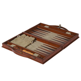 An open wooden backgammon game set with a leather handle, tan velvet pouch, and wooden dice, shown on a plain white background.