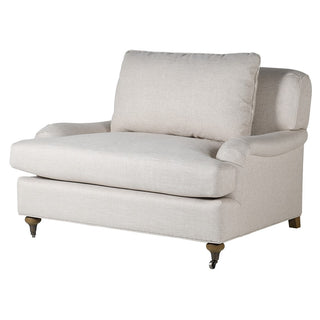 The Ronald Chair – beige Belgian roll armchair with oak legs, available at Lily Bloom, Gorey, Ireland