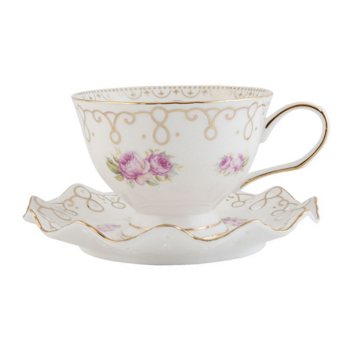 White porcelain with gold trim rose cup and saucer